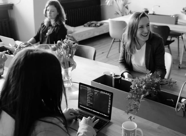 Three bussiness women having a bussiness meeting